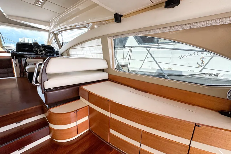 Ll On The Rocks Yacht Photos Pics Luxurious interior of 2012 Azimut Fly 53 yacht with elegant wood and leather finishes.
