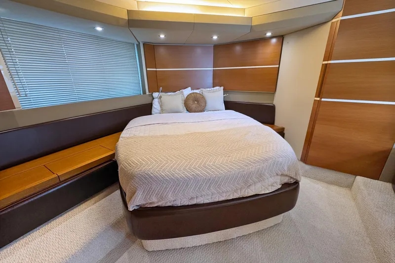 Ll On The Rocks Yacht Photos Pics Luxurious bedroom interior of 2012 Azimut Fly 53 yacht with modern design elements.