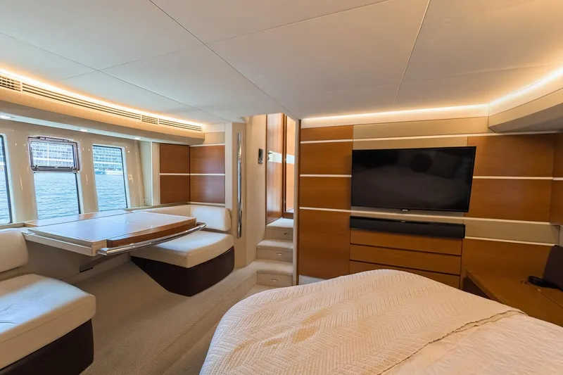 Ll On The Rocks Yacht Photos Pics Luxurious interior of 2012 Azimut Fly 53 yacht with modern furnishings and large windows.