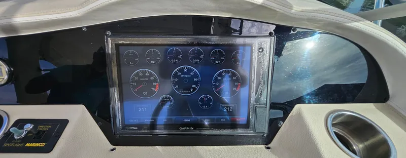  Yacht Photos Pics Dashboard of 2018 Regal 33 XO boat with digital gauges display.