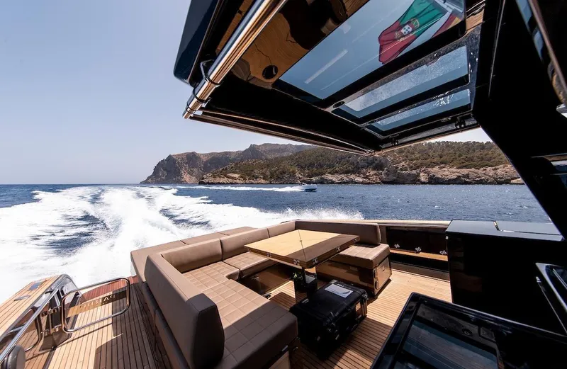  Yacht Photos Pics Luxurious 2022 Pardo Yachts 50 cruising with scenic ocean and coastline views.