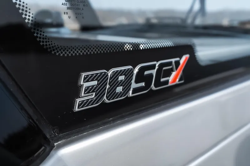  Yacht Photos Pics 2026 Fountain 38 SCX logo on sleek boat exterior.