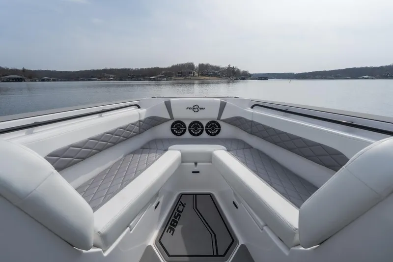  Yacht Photos Pics 2026 Fountain 38 SCX boat interior with luxurious seating and lake view.