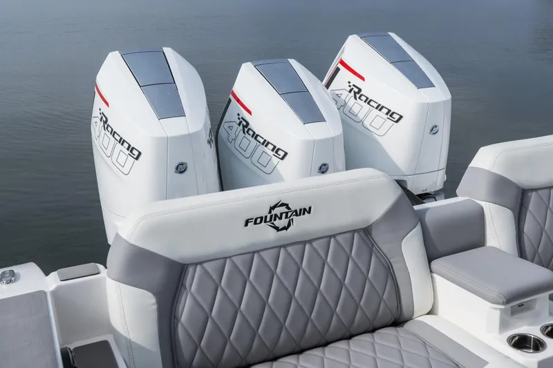  Yacht Photos Pics 2026 Fountain 38 SCX boat with triple Racing 400 engines, featuring luxurious seating.