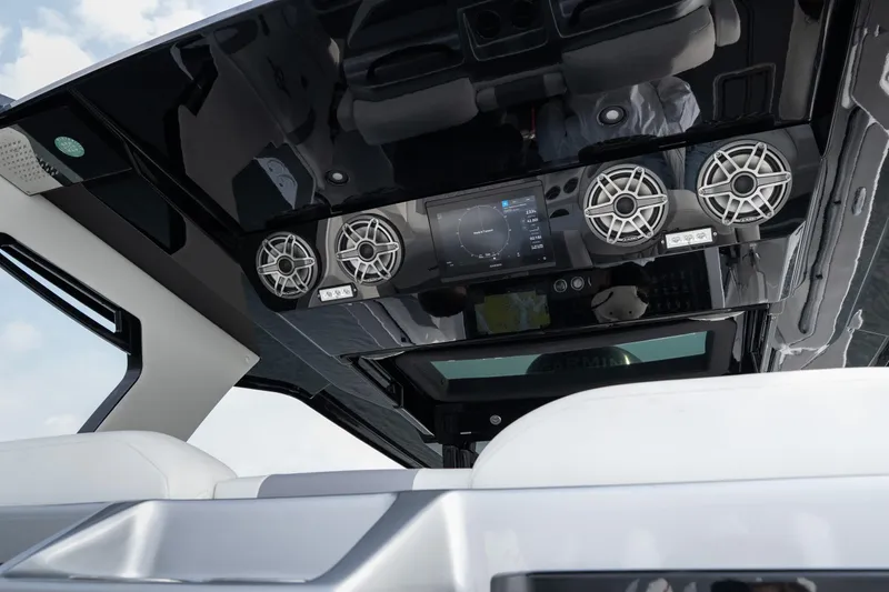  Yacht Photos Pics 2026 Fountain 38 SCX boat interior with advanced audio system and sleek design.