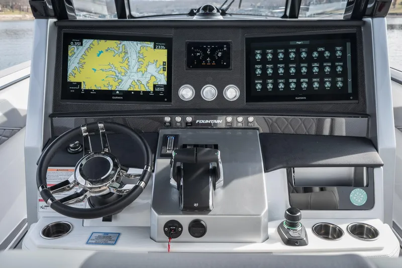  Yacht Photos Pics 2026 Fountain 38 SCX boat dashboard with advanced navigation and control systems.