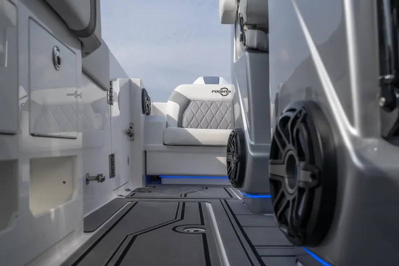  Yacht Photos Pics 2026 Fountain 38 SCX boat interior with sleek seating and modern design elements.