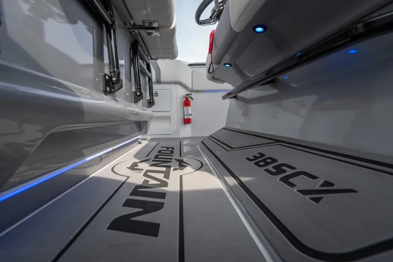  Yacht Photos Pics 2026 Fountain 38 SCX boat interior with sleek design and ambient blue lighting.