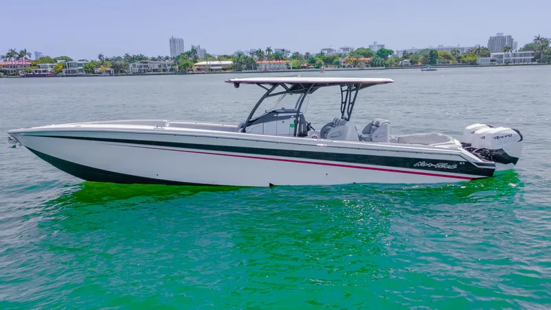  Yacht Photos Pics 2019 Nor-Tech 390 Sport boat on clear water, sleek design, sunny day.