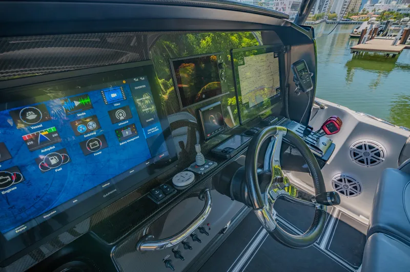  Yacht Photos Pics 2019 Nor-Tech 390 Sport boat dashboard with advanced navigation and control systems.