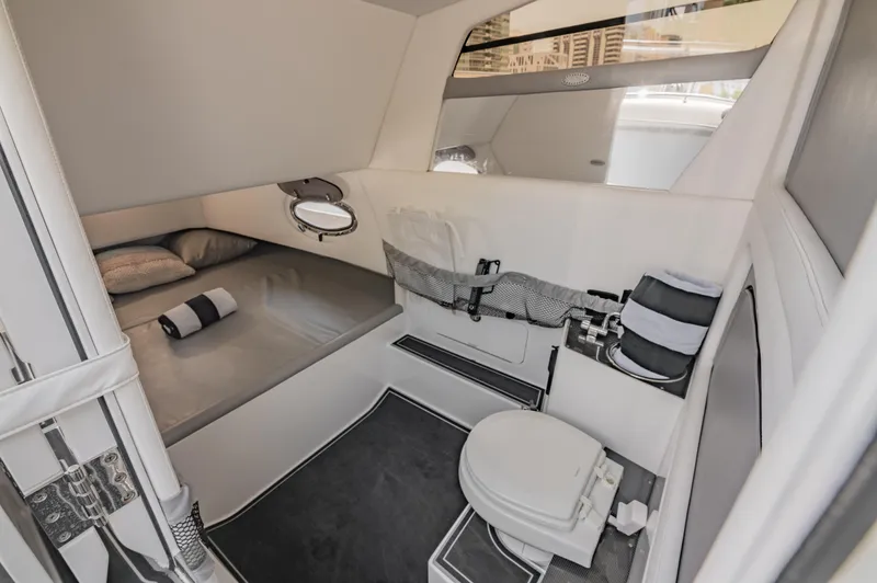  Yacht Photos Pics Interior cabin of 2019 Nor-Tech 390 Sport boat with bed and toilet.