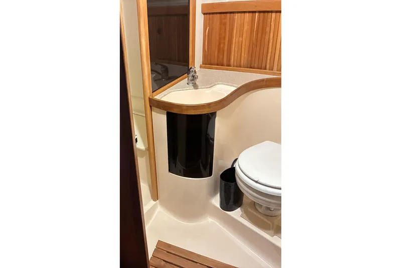  Yacht Photos Pics 1994 Sabre 362 yacht bathroom with wooden accents and compact design.