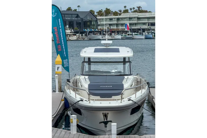  Yacht Photos Pics Nimbus T11 2022 boat docked at marina with rental sign.