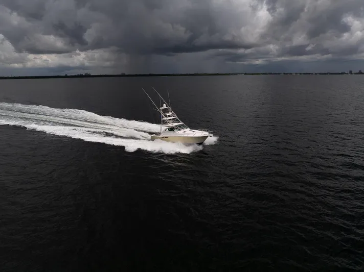 Mutiny Yacht Photos Pics 2004 Tiara Yachts 4200 Open cruising on dark waters under stormy skies.