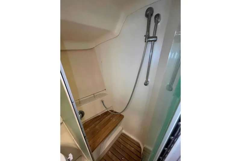 Snail'n Yacht Photos Pics Shower area in 2010 Hunter 45 Center Cockpit yacht with wooden flooring.