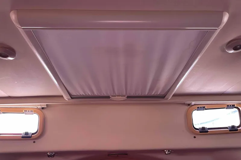 Snail'n Yacht Photos Pics Ceiling view of 2010 Hunter 45 Center Cockpit with skylight and windows.