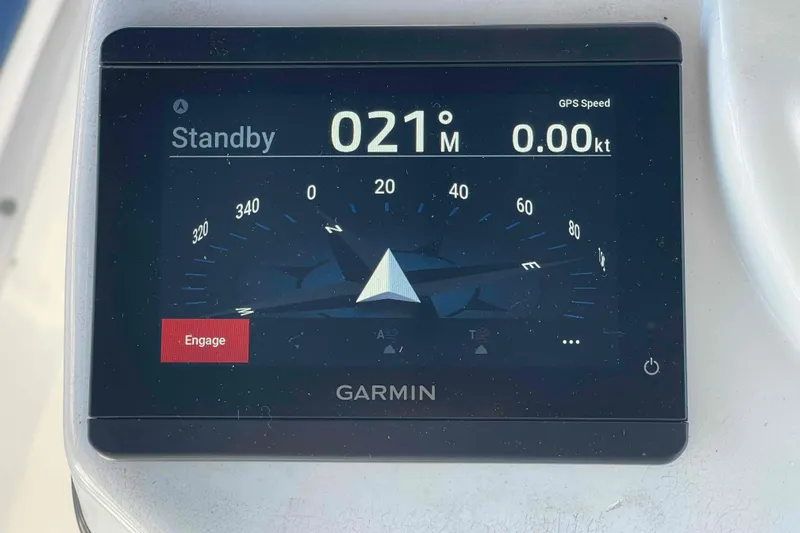 Snail'n Yacht Photos Pics Garmin navigation display on 2010 Hunter 45 Center Cockpit, showing standby mode and GPS speed.