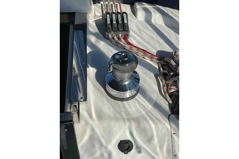 Snail'n Yacht Photos Pics Winch and ropes on 2010 Hunter 45 Center Cockpit sailboat deck.
