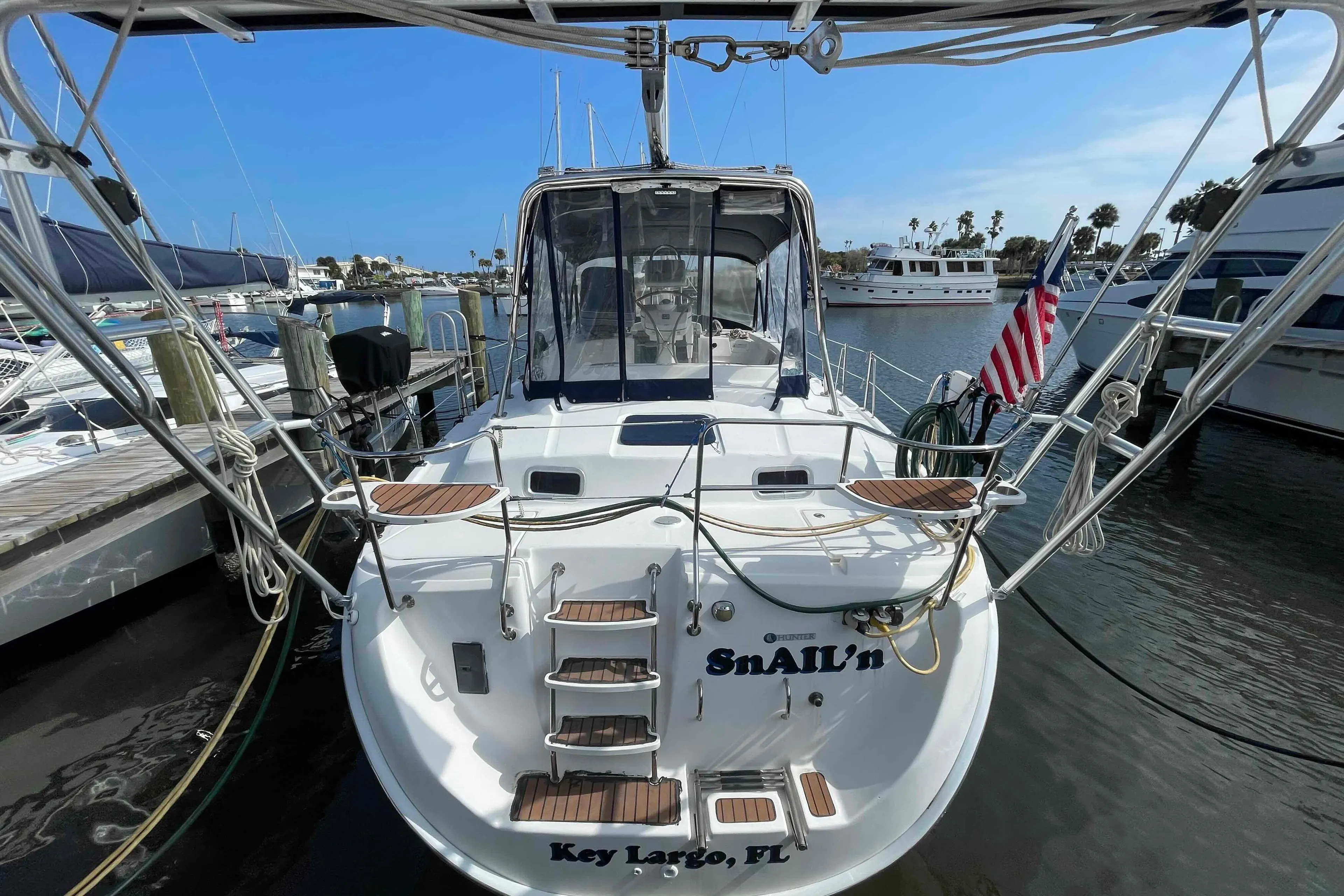 2010 Hunter 45 Center Cockpit sailboat docked in marina, Key Largo, Florida.