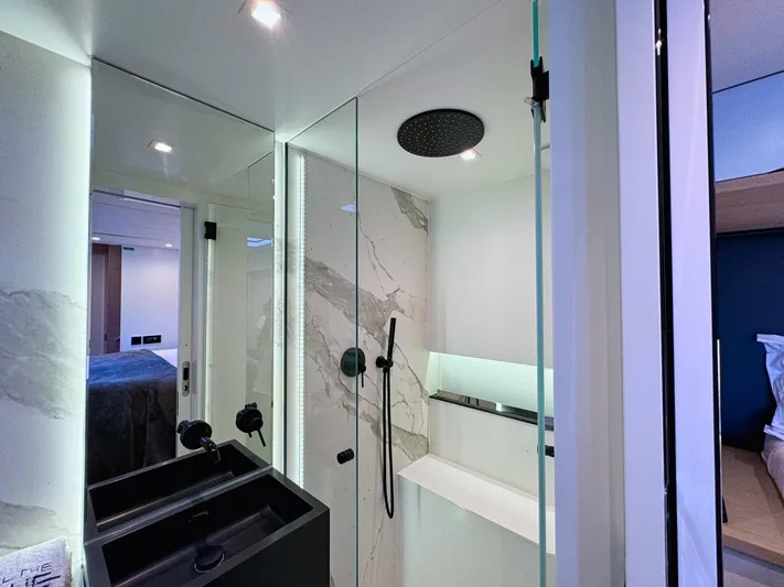 Feel The Blue Yacht Photos Pics Luxurious bathroom in 2018 Sunreef 60 yacht with modern shower and sleek design.