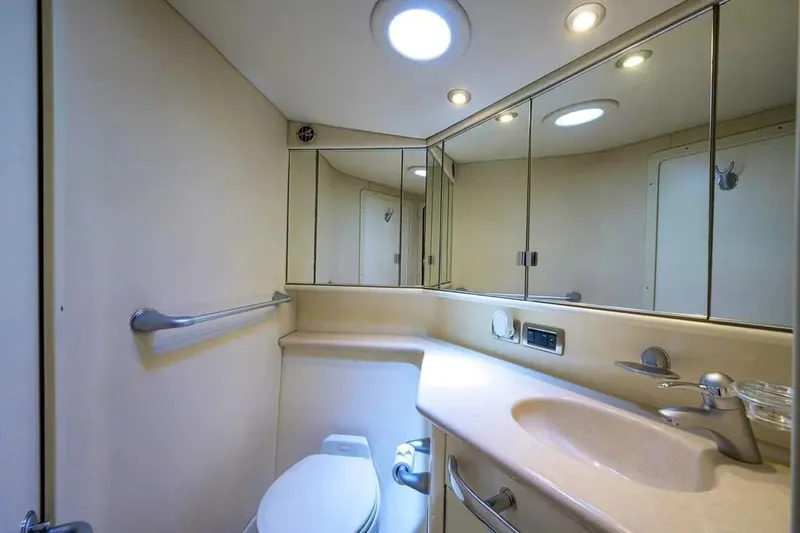 Still The One Yacht Photos Pics Luxurious bathroom in 2004 Sea Ray 550 Sundancer yacht with modern fixtures.
