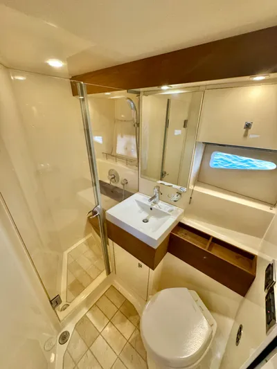 Yacht Photos Pics Luxurious bathroom in 2013 Sea Ray 410 Sundancer yacht with modern fixtures.