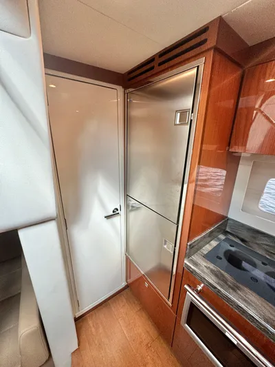  Yacht Photos Pics 2013 Sea Ray 410 Sundancer yacht interior with modern kitchen appliances.