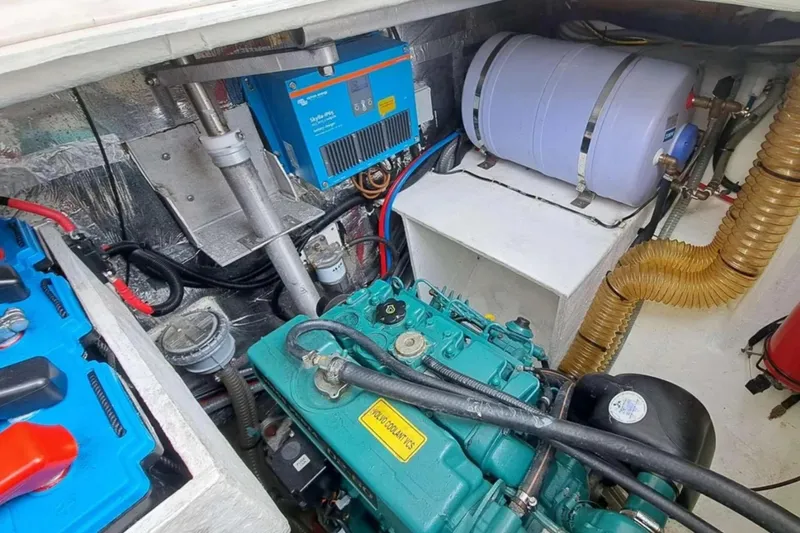 Aquanimity Yacht Photos Pics Engine room of 2021 Dufour 48 yacht with visible components and wiring.