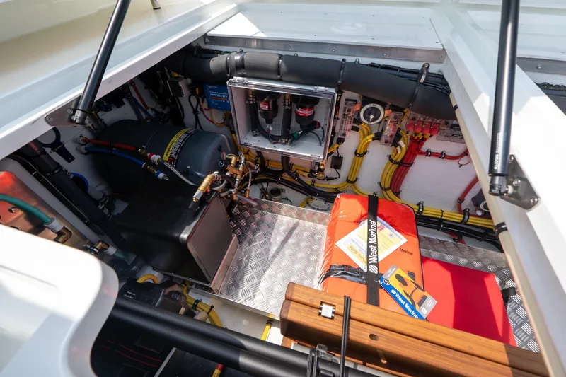 Stock 6 Yacht Photos Pics Engine compartment of 2026 Targa 32 GT boat, showcasing wiring and equipment.