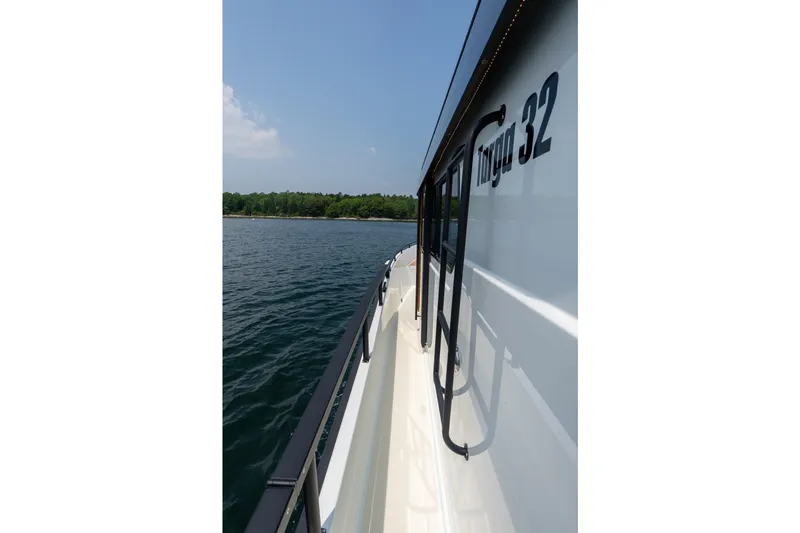 Stock 6 Yacht Photos Pics 2026 Targa 32 GT boat side view on calm water.