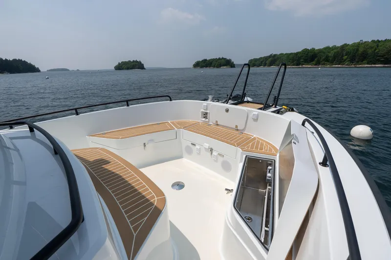 Stock 6 Yacht Photos Pics 2026 Targa 32 GT boat deck with scenic water and island view.
