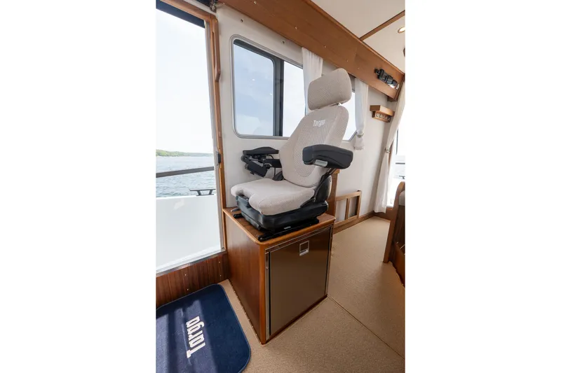 Stock 6 Yacht Photos Pics Captain's chair in 2026 Targa 32 GT boat interior, featuring modern design and comfort.