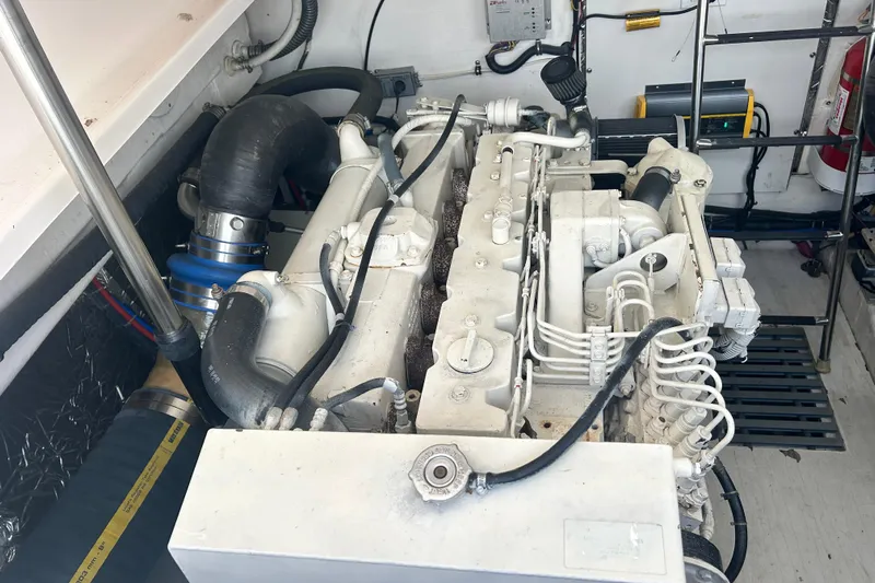 Freedom Yacht Photos Pics Engine room of a 2004 Tiara Yachts 36 Sovran, showcasing mechanical components.