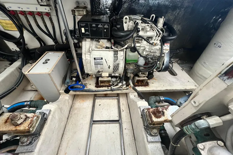 Freedom Yacht Photos Pics Engine compartment of a 2004 Tiara Yachts 36 Sovran, featuring a Kohler generator.