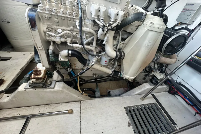 Freedom Yacht Photos Pics Engine room of a 2004 Tiara Yachts 36 Sovran, showcasing detailed machinery components.