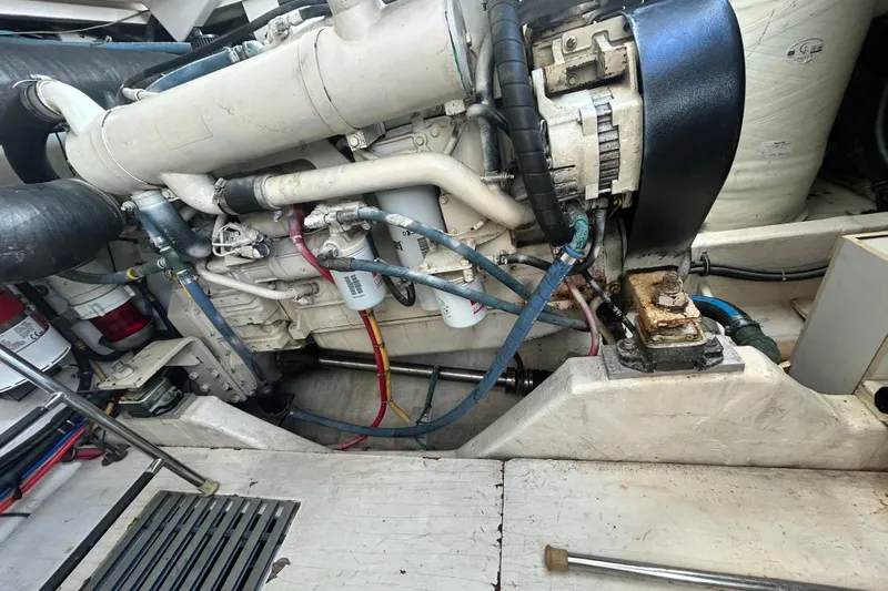 Freedom Yacht Photos Pics Engine compartment of a 2004 Tiara Yachts 36 Sovran, showcasing mechanical components.