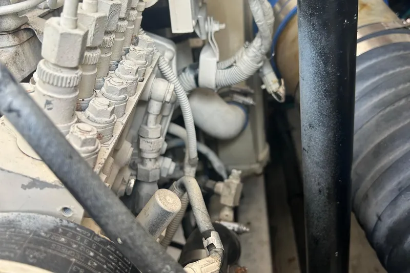 Freedom Yacht Photos Pics Engine components of a 2004 Tiara Yachts 36 Sovran, showcasing intricate mechanical details.