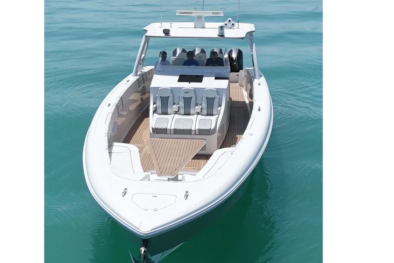  Yacht Photos Pics 2017 Midnight Express 43 Open boat on calm water, showcasing sleek design and spacious deck.