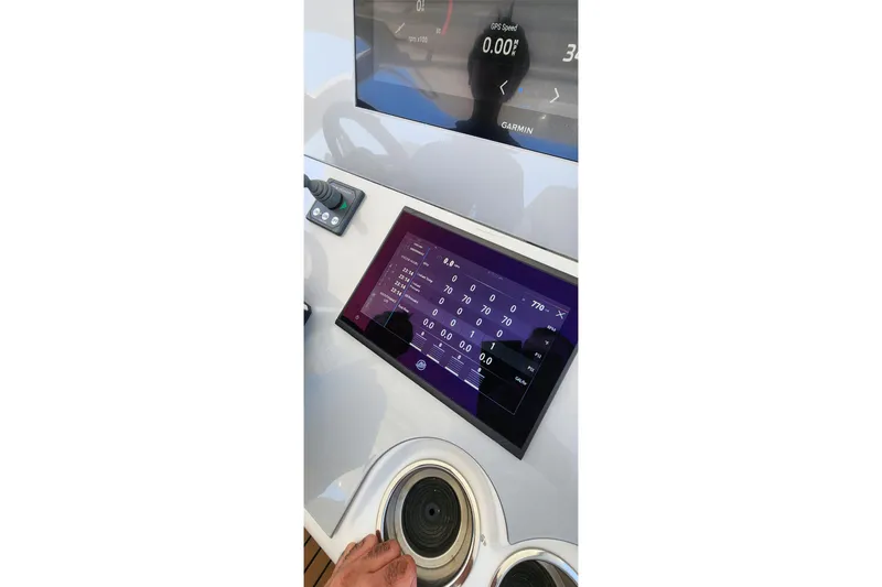  Yacht Photos Pics Control panel of a 2017 Midnight Express 43 Open boat with digital display.