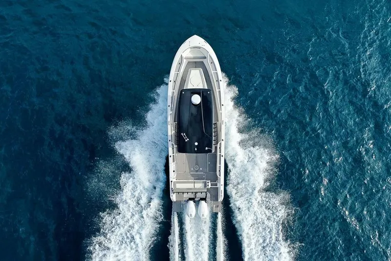  Yacht Photos Pics Aerial view of 2025 SeaWell 345XL boat cruising on open blue water.
