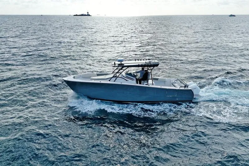  Yacht Photos Pics 2025 SeaWell 345XL boat cruising on open ocean waters.