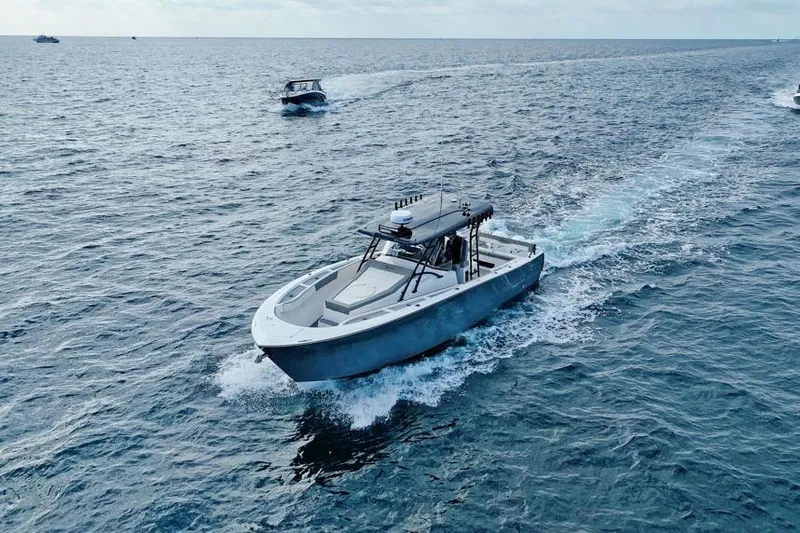  Yacht Photos Pics 2025 SeaWell 345XL boat cruising on open water, showcasing sleek design and performance.