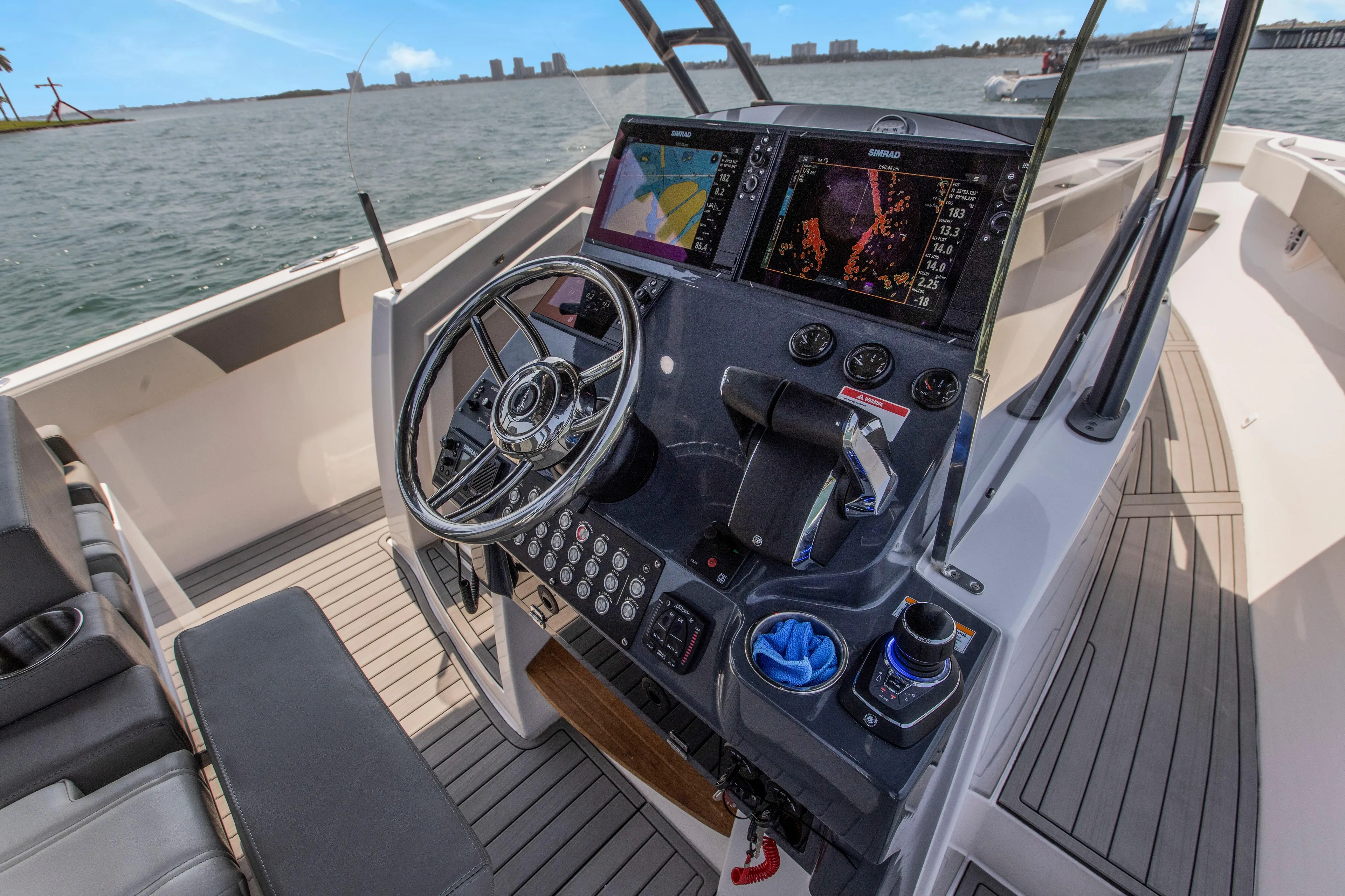  Yacht Photos Pics Modern SeaWell 345XL boat helm with advanced navigation systems, 2025 model.