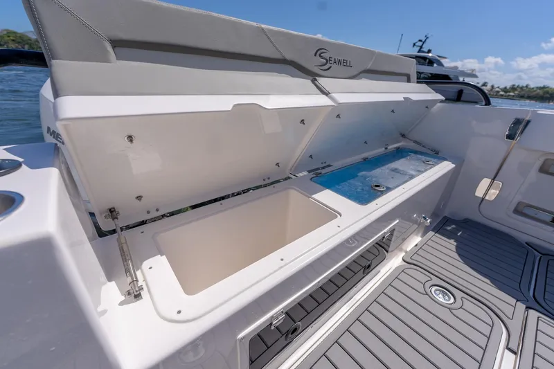  Yacht Photos Pics Open storage compartment on 2025 SeaWell 345XL boat, featuring sleek design and spacious interior.