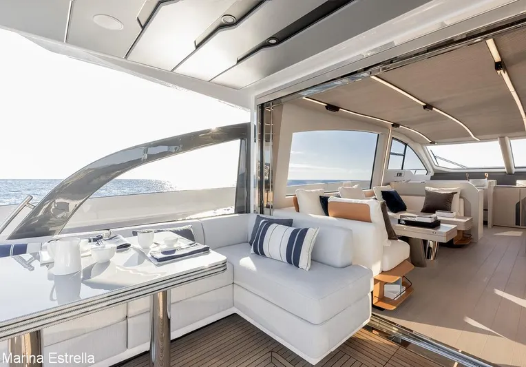  Yacht Photos Pics Luxurious 2025 Azimut S7 yacht interior with elegant seating and ocean view.