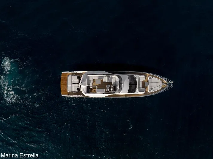  Yacht Photos Pics Aerial view of 2025 Azimut S7 yacht cruising on dark blue ocean waters.