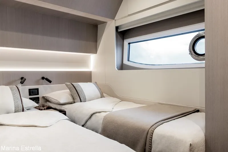  Yacht Photos Pics Luxurious twin bedroom in 2025 Azimut S7 yacht with modern design and elegant decor.