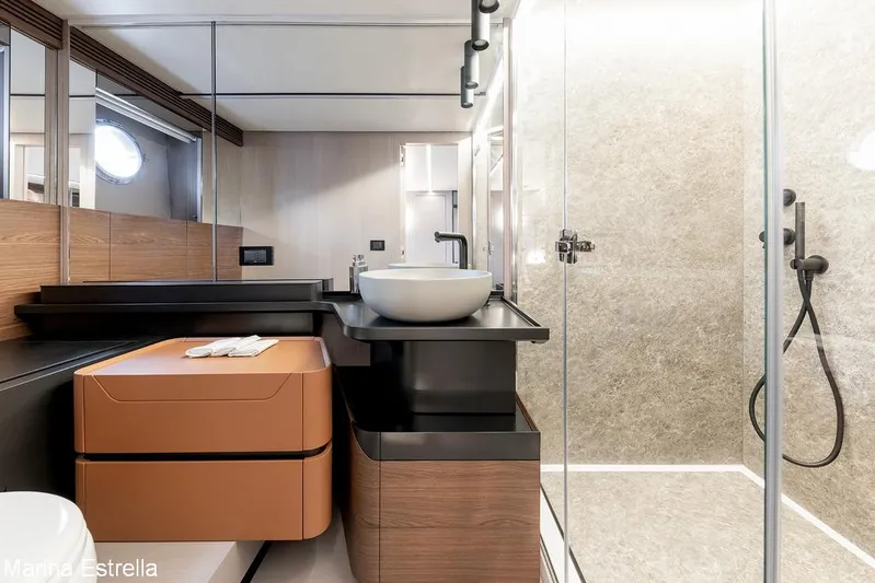  Yacht Photos Pics Modern bathroom interior in 2025 Azimut S7 yacht with sleek design and glass shower.