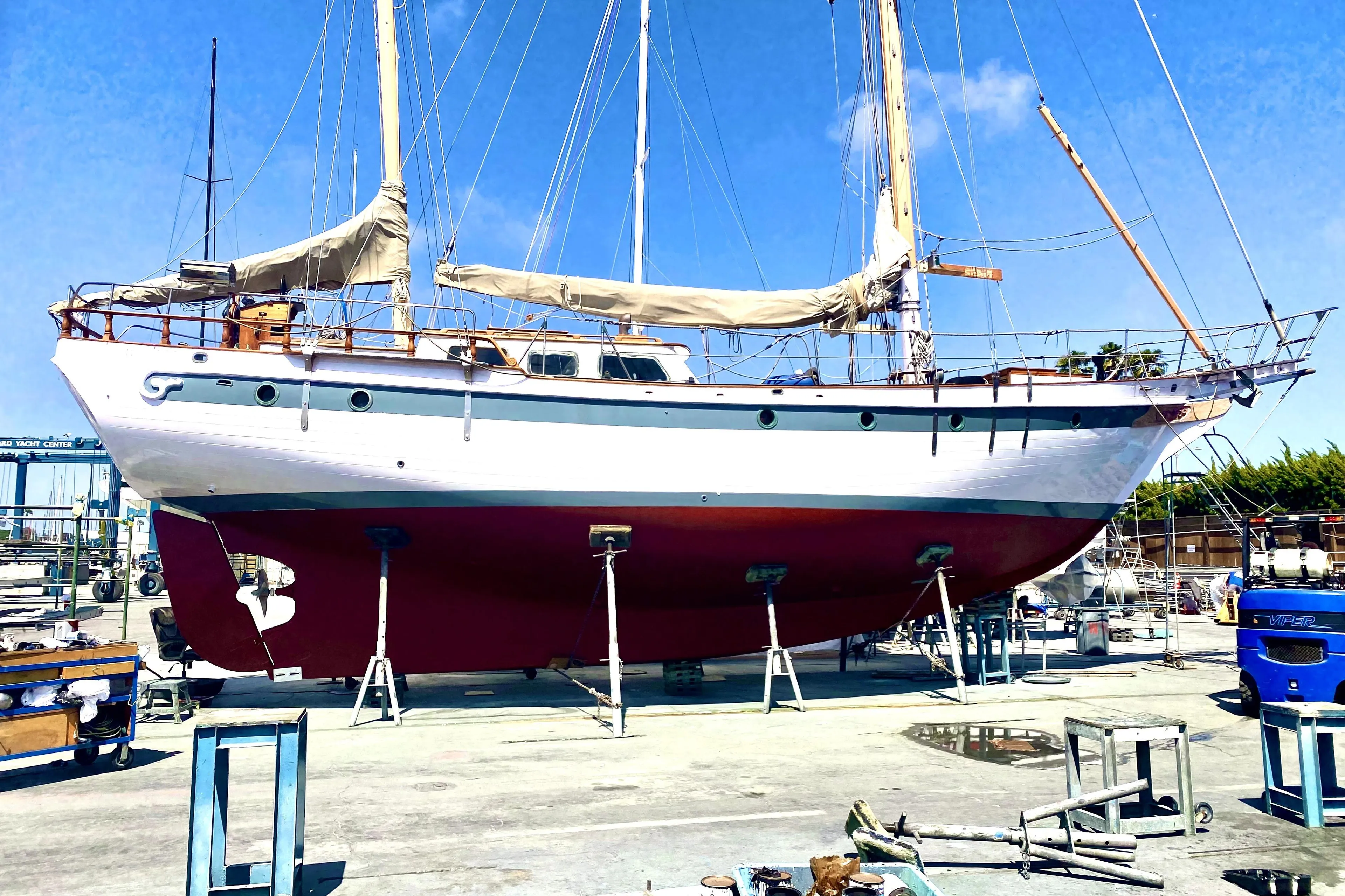 Vintage 1979 Formosa 51 sailboat on dry dock, showcasing classic design and craftsmanship.