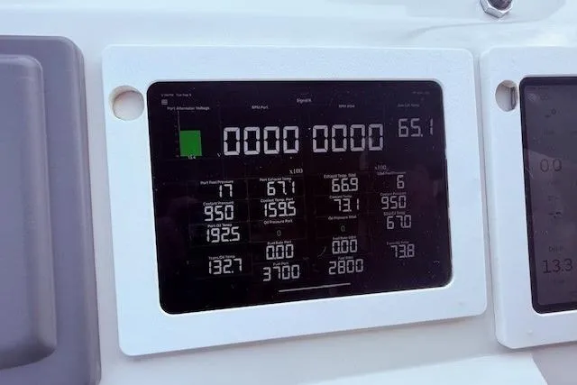  Yacht Photos Pics Digital display panel on a 2007 Navigator 58 boat showing various engine metrics.
